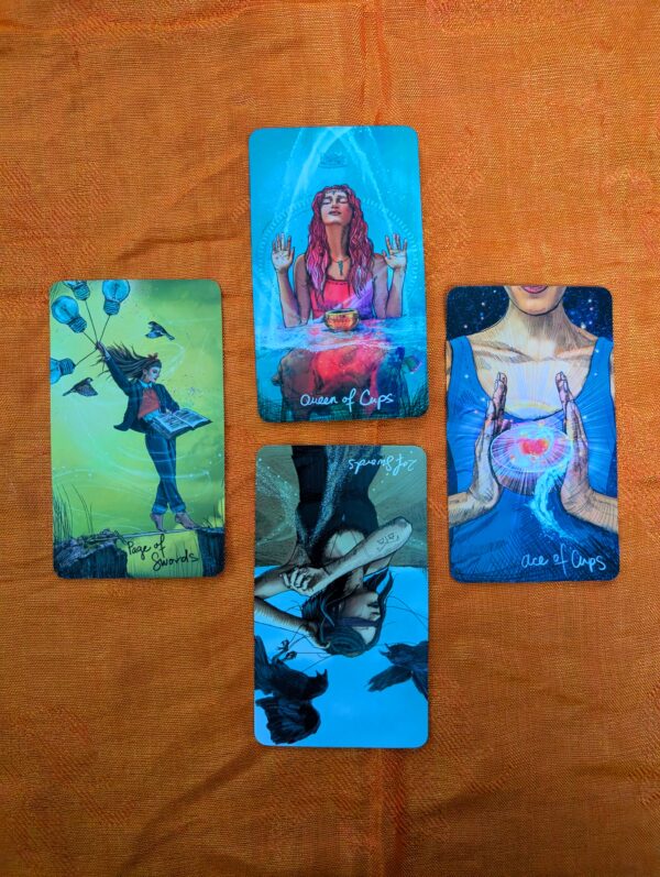 4 tarot cards in a diamond shape